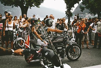 Photo of Two Persons Riding Motorcycle