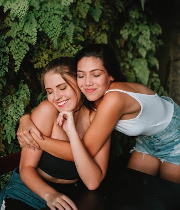 Photo Of Two Women Hugging Each Other