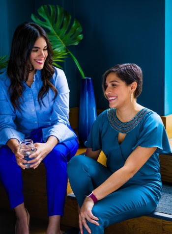 Photo of Two Women Sitting