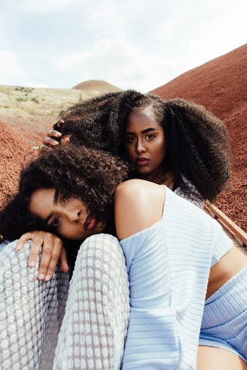 Photo of Two Women With Afro Hairstyle
