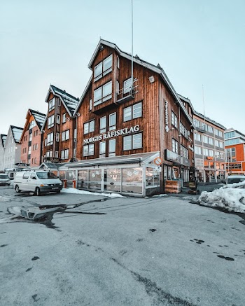 Photo of Van Parked in Front of Building