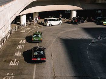 Photo of Vehicles Near Building