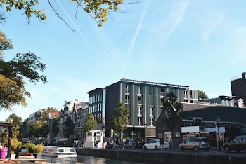 Photo of Vehicles Near Buildings
