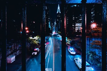photo of vehicles on road