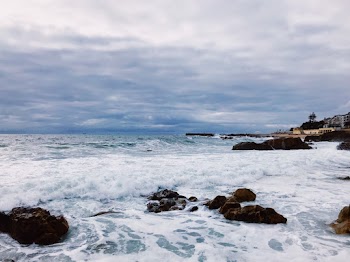 Photo of Waves Splashing by the Seashore
