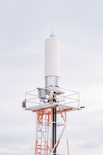 photo of white and gray metal tower