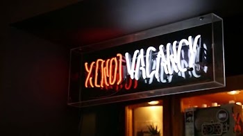 photo of white and orange LED signage