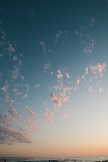 Photo of White Clouds During Golden Hour