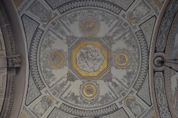 photo of white, gray, and yellow building ceiling