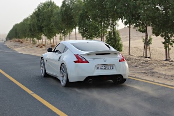 Photo of White Nissan 370Z Nismo on the Road