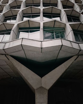 photo of white painted building at daytime