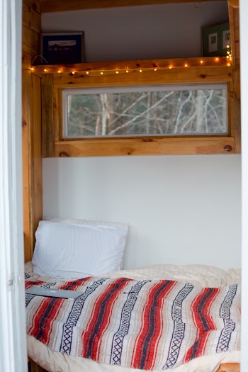 Photo Of White Pillow Under String Lights