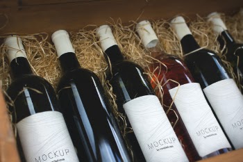 Photo of Wine Bottles in a row
