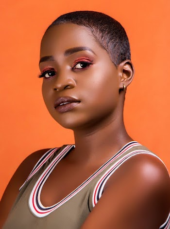 Photo of Woman Against Orange Background