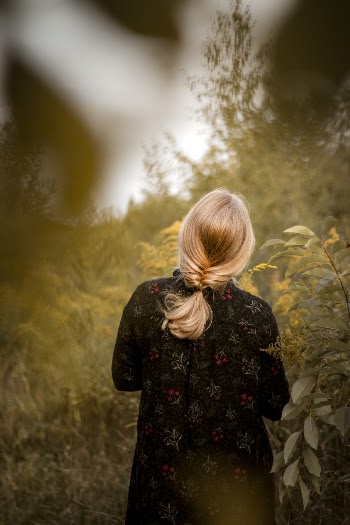 Photo Of Woman Beside Plants