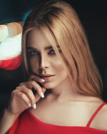 Photo Of Woman Biting Her Nails
