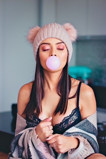 Photo Of Woman Blowing Bubble Gum