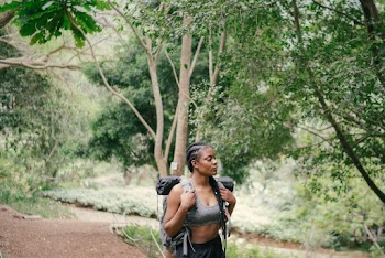 Photo Of Woman Carrying Backpack