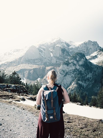 Photo of Woman Carrying Backpack