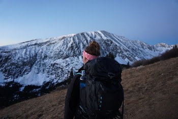 Photo of Woman Carrying Black Bag