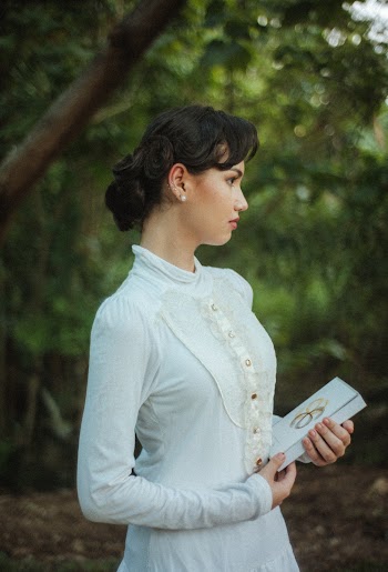 Photo Of Woman Carrying Book