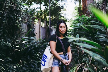 Photo of Woman Carrying Camera