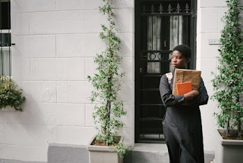 Photo Of Woman Carrying Envelope