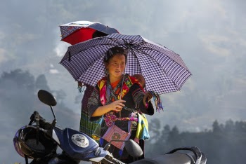 Photo Of Woman Carrying Her Child