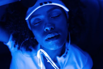 Photo Of Woman Closing Her Eyes