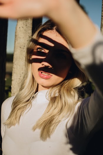 Photo of Woman Covering Her Face