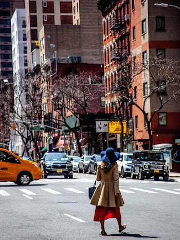 Photo of Woman Crossing the Road