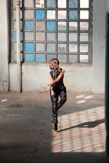 Photo of Woman Dancing Inside Empty Building