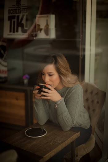 Photo of Woman Drinking Coffee