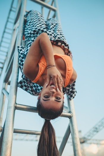 Photo Of Woman Hanging Upside Down