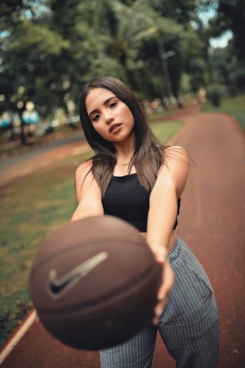 Photo of Woman Holding A Ball