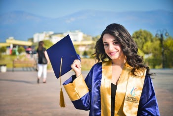 Photo Of Woman Holding A Graduation Cap