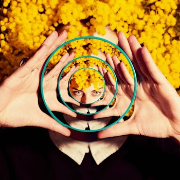 Photo Of Woman Holding A Mirror