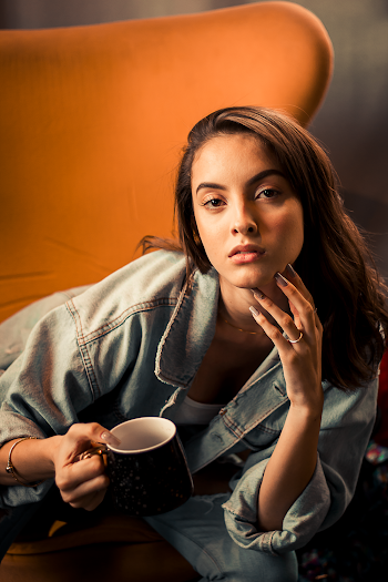 Photo Of Woman Holding A Mug