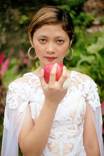 Photo Of Woman Holding Apple