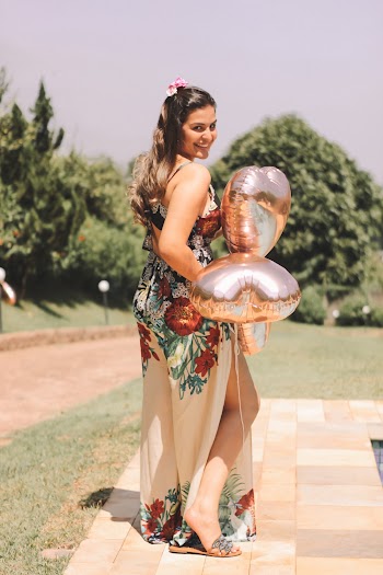 Photo Of Woman Holding Balloon