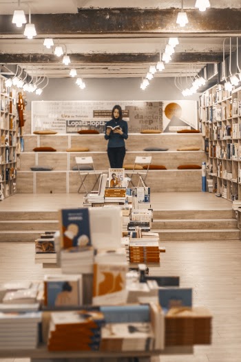 Photo Of Woman Holding Book