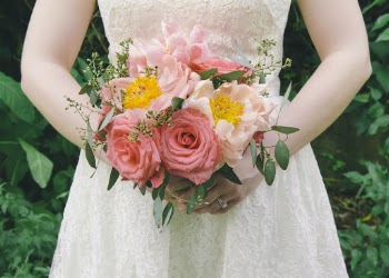 Photo of Woman Holding Bouquet