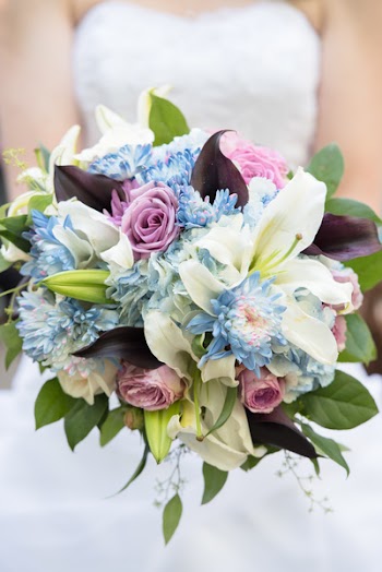 Photo of Woman Holding Bouquet Of Flowers