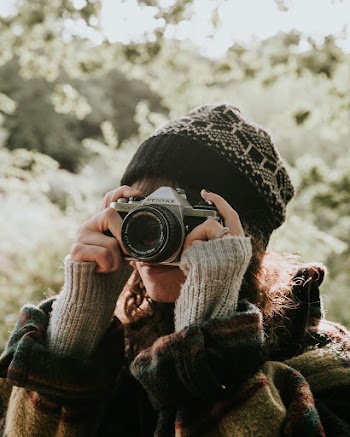 Photo Of Woman Holding Camera  