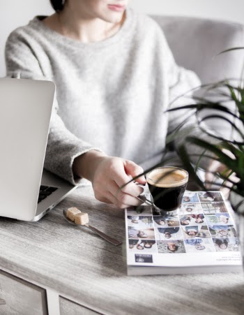 Photo of Woman Holding Clear Glass Mug