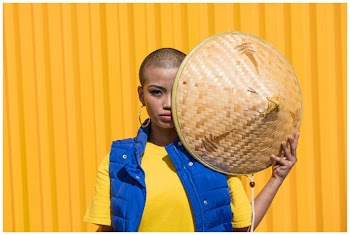 Photo Of Woman Holding Conical Hat