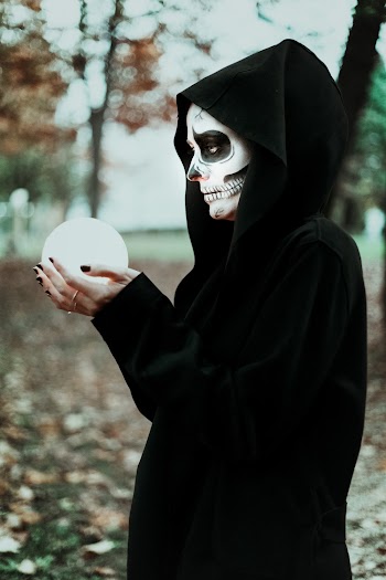 Photo Of Woman Holding Crystal Ball