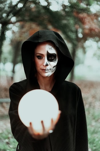 Photo Of Woman Holding Crystal Ball