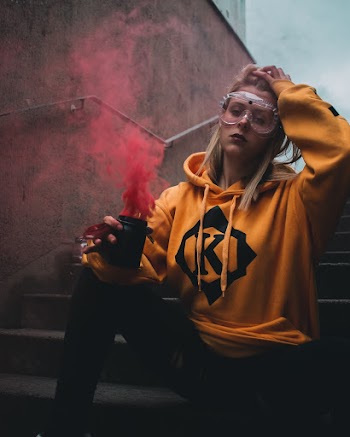 Photo Of Woman Holding Flare Smoke 