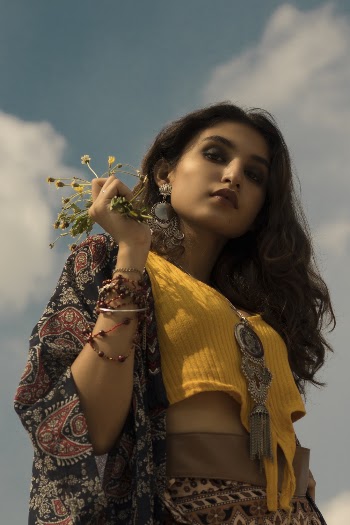 Photo Of Woman Holding Flowers
